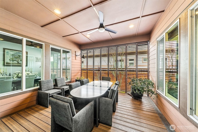 sunroom featuring recessed lighting and hardwood / wood-style flooring