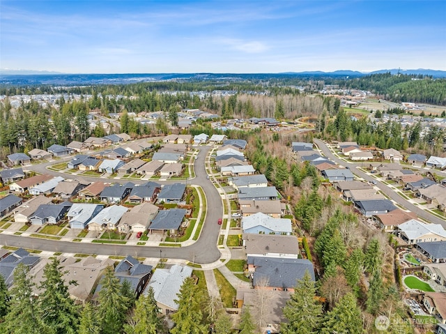 bird's eye view with a residential view and a mountain view