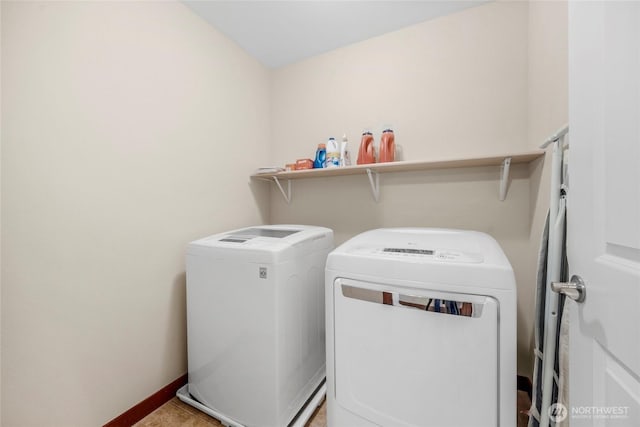 laundry room with light tile patterned floors, laundry area, independent washer and dryer, and baseboards