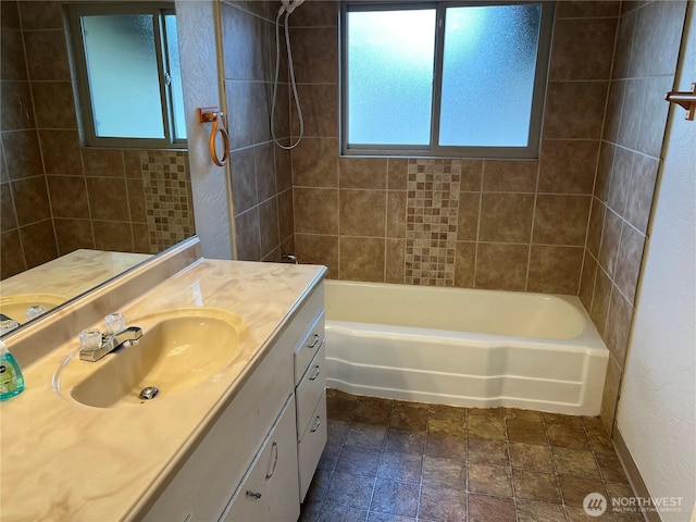 full bath with vanity and shower / bath combination