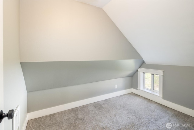 308 S 1st St, Roslyn, WA 98941 - bonus room featuring baseboards, vaulted ceiling, and carpet flooring