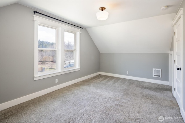 308 S 1st St, Roslyn, WA 98941 - bonus room with vaulted ceiling, carpet floors, visible vents, and baseboards