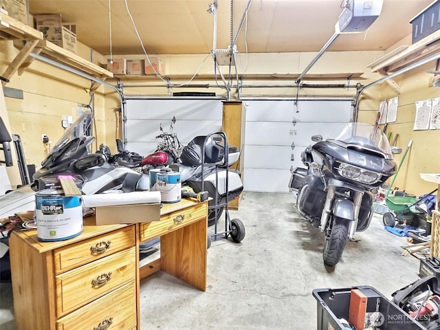 garage featuring a garage door opener