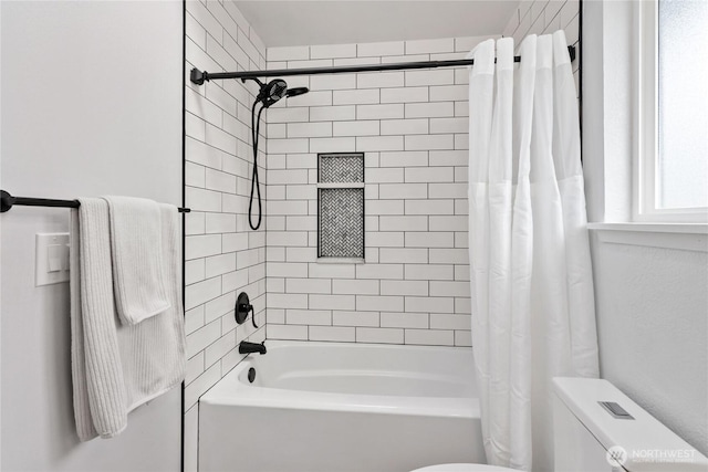 full bath featuring toilet and shower / tub combo