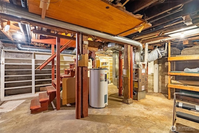 unfinished below grade area featuring stairway, heating unit, and electric water heater