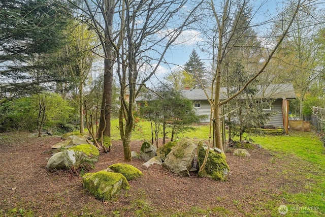 view of yard featuring fence