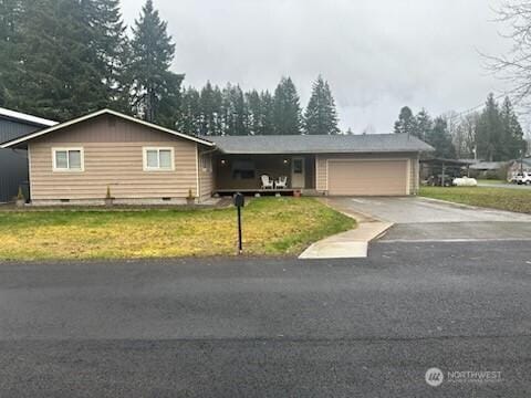 310 Kosmos Ln, Morton, WA 98356 - ranch-style house featuring crawl space, a garage, a front lawn, and driveway