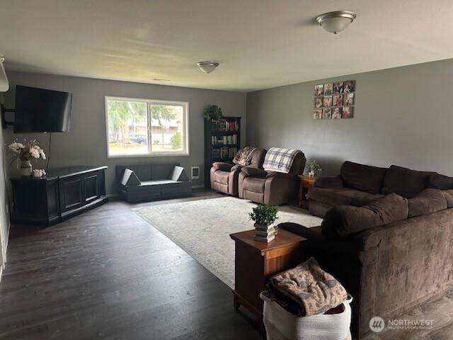 310 Kosmos Ln, Morton, WA 98356 - living room featuring dark wood-style floors