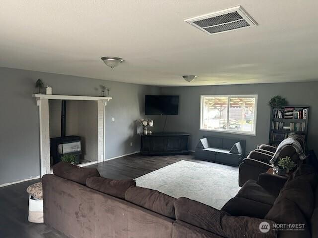 310 Kosmos Ln, Morton, WA 98356 - living area with visible vents and wood finished floors