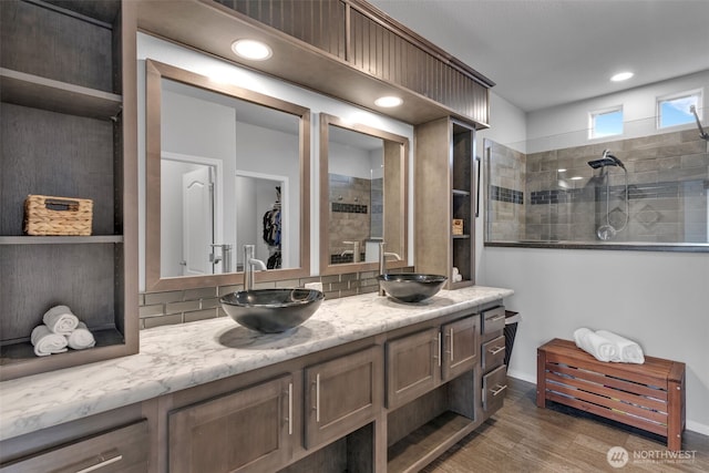 404 Airport Way SW, Mattawa, WA 99349 - bathroom with a sink, decorative backsplash, double vanity, and a walk in shower