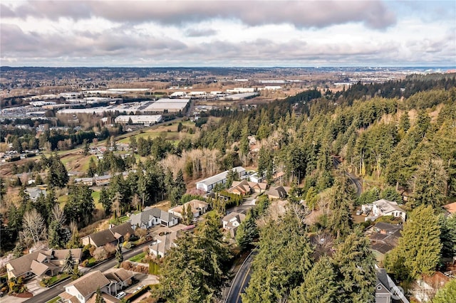 aerial view with a residential view and a wooded view