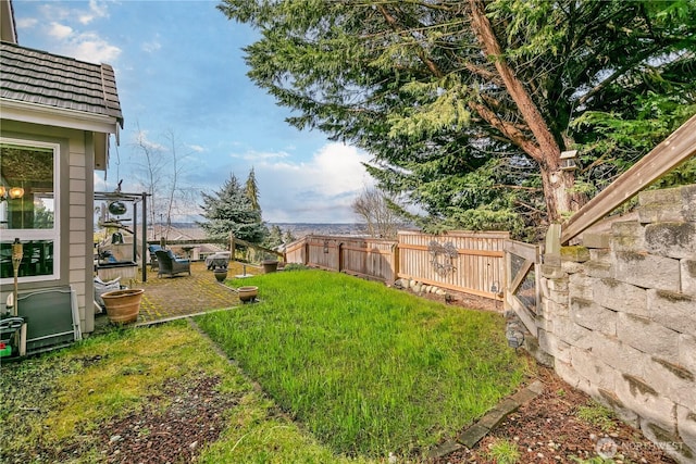 view of yard featuring a fenced backyard