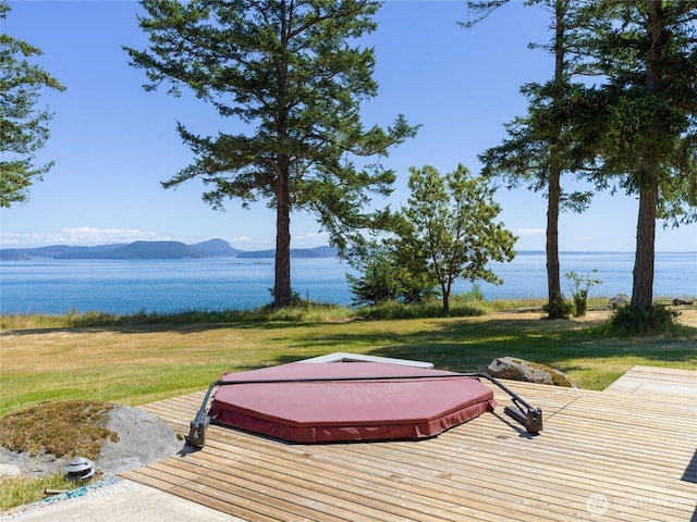 146 E Meadow Ln, Decatur Island, WA 98221 - wooden deck with a covered hot tub and a water and mountain view