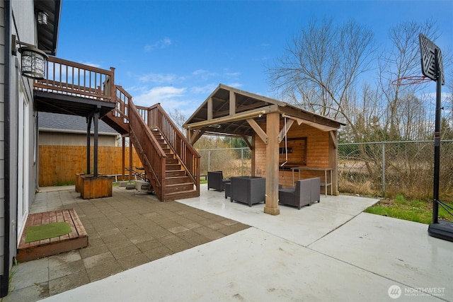 view of patio / terrace with stairway and a fenced backyard