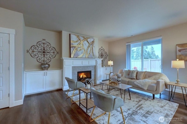 12225 SE 271st Pl, Kent, WA 98030 - living room with baseboards, a fireplace, and dark wood-style flooring