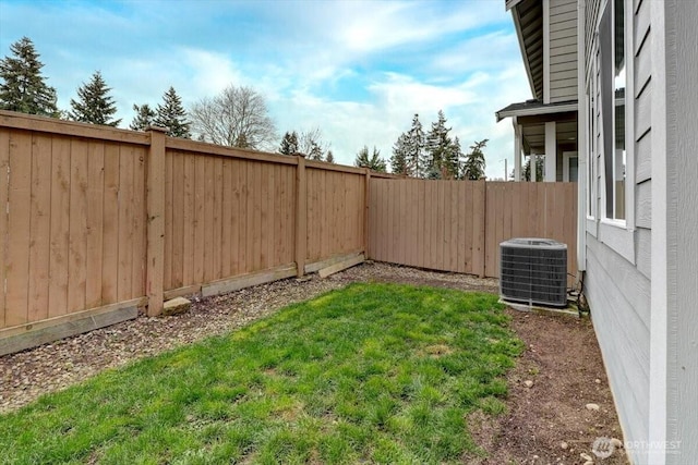 12225 SE 271st Pl, Kent, WA 98030 - view of yard with cooling unit and a fenced backyard