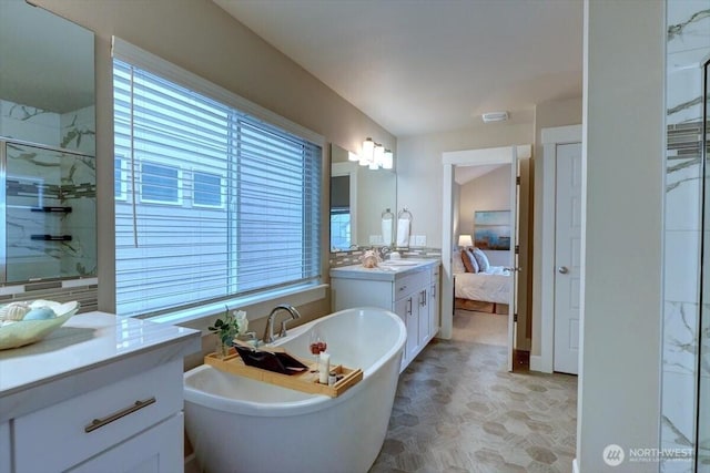 12225 SE 271st Pl, Kent, WA 98030 - full bath with a soaking tub, ensuite bath, vanity, and a marble finish shower