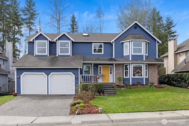 traditional-style home featuring a front yard, an attached garage, aphalt driveway, a shingled roof, and a porch