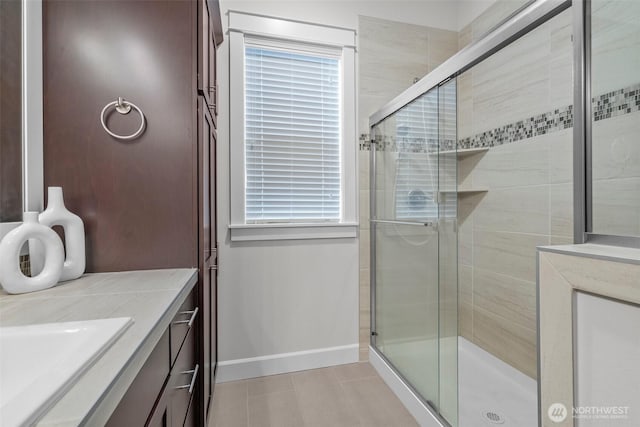 3727 Oakwood St SE, Olympia, WA 98513 - full bath featuring a shower stall, vanity, and baseboards