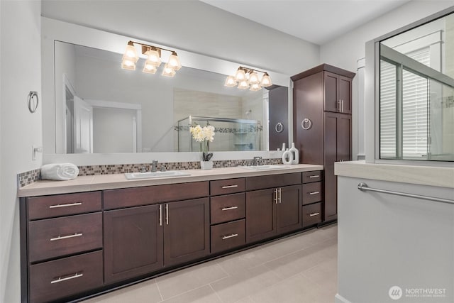3727 Oakwood St SE, Olympia, WA 98513 - full bath with double vanity, tile patterned flooring, a stall shower, and a chandelier