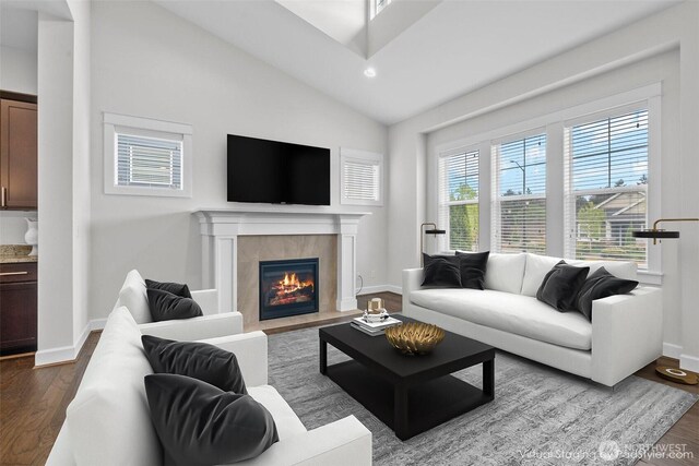 3727 Oakwood St SE, Olympia, WA 98513 - living room featuring vaulted ceiling, dark wood-type flooring, a fireplace, baseboards, and recessed lighting