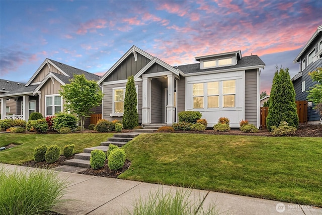 3727 Oakwood St SE, Olympia, WA 98513 - view of front facade featuring board and batten siding and a front lawn