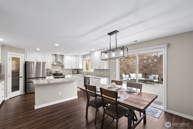 dining space featuring recessed lighting, visible vents, and dark wood-style flooring