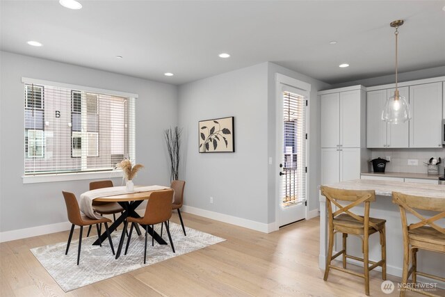 18 160th St SE, Bothell, WA 98012 - dining room with light wood-type flooring and recessed lighting