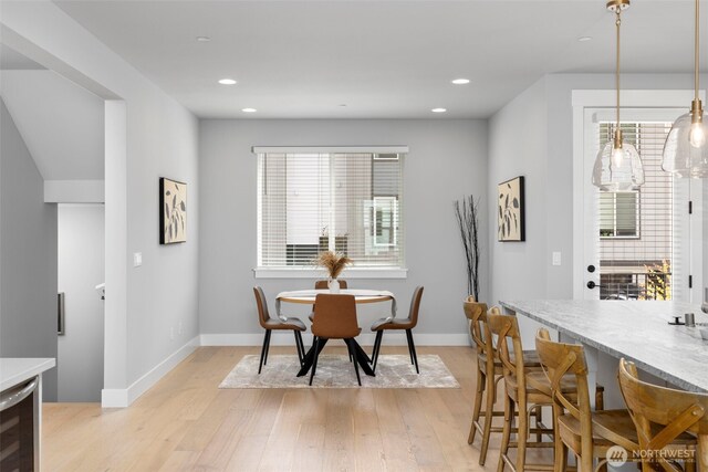 18 160th St SE, Bothell, WA 98012 - dining area with light wood-style floors, beverage cooler, and recessed lighting