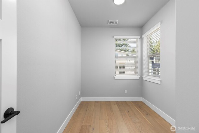 18 160th St SE, Bothell, WA 98012 - empty room with light wood-style floors and baseboards