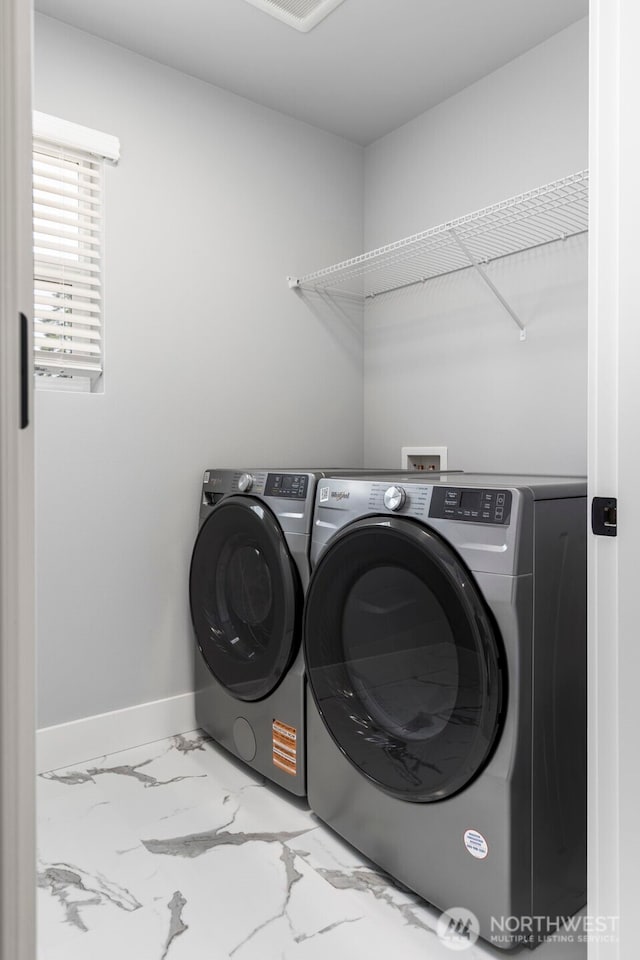 18 160th St SE, Bothell, WA 98012 - laundry area with washing machine and dryer and marble finish floors