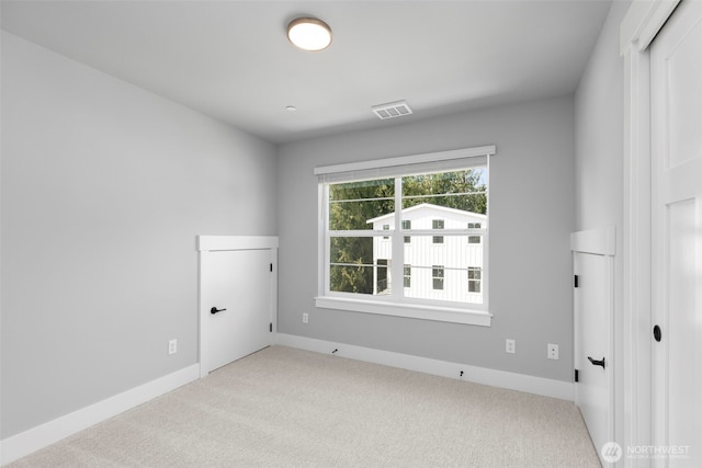 18 160th St SE, Bothell, WA 98012 - carpeted spare room with baseboards