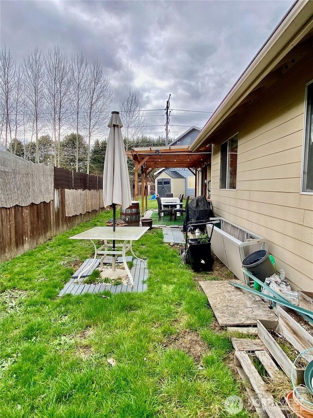 631 6th Ave S, Kent, WA 98032 - view of yard featuring a patio, outdoor dining space, a pergola, and fence