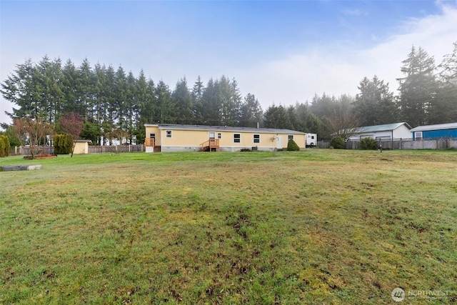 view of yard with fence