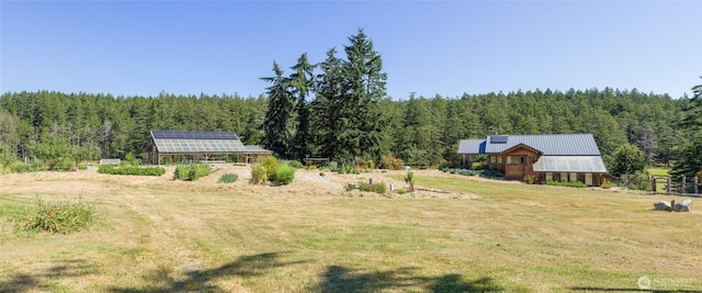 631 Cousins Rd, Lopez Island, WA 98261 - view of yard featuring an outbuilding, a rural view, and a forest view