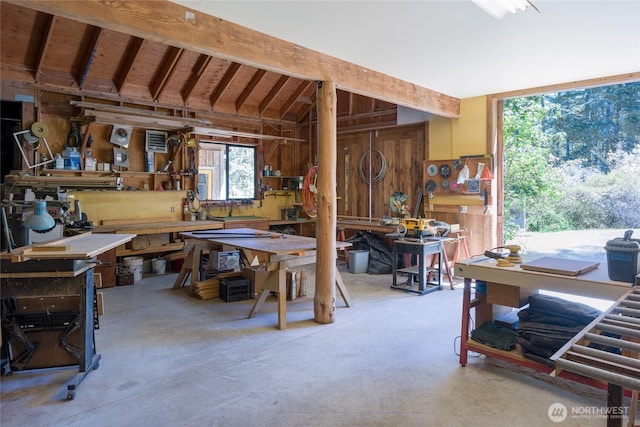 631 Cousins Rd, Lopez Island, WA 98261 - miscellaneous room featuring beam ceiling, a workshop area, and concrete floors