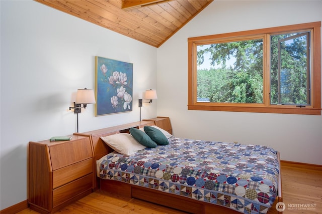 631 Cousins Rd, Lopez Island, WA 98261 - bedroom featuring vaulted ceiling, wood ceiling, light wood-type flooring, and baseboards
