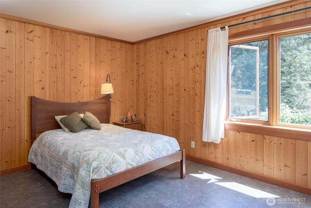 631 Cousins Rd, Lopez Island, WA 98261 - bedroom featuring wood walls and baseboards