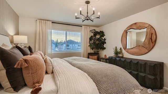 bedroom featuring a chandelier