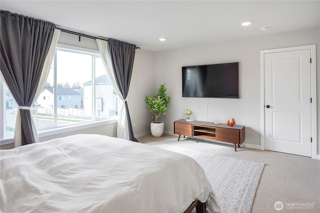bedroom featuring baseboards, carpet, and recessed lighting