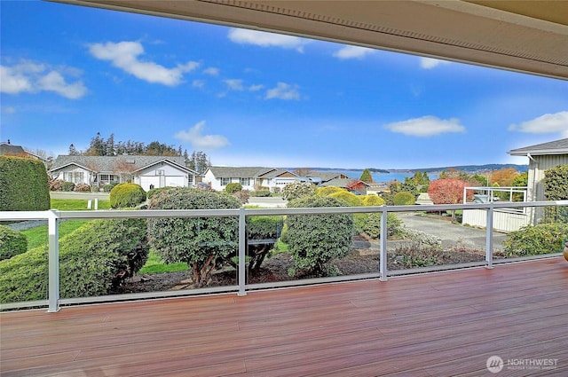 wooden deck with a residential view
