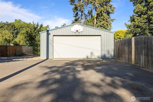 detached garage with fence