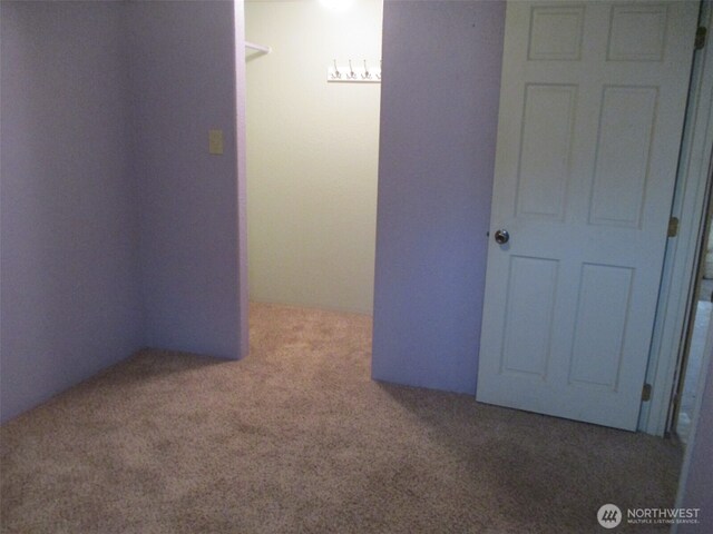empty room featuring carpet floors