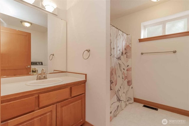 4195 Windy Cove Ln, Clinton, WA 98236 - full bath featuring a shower with curtain, visible vents, vanity, and baseboards