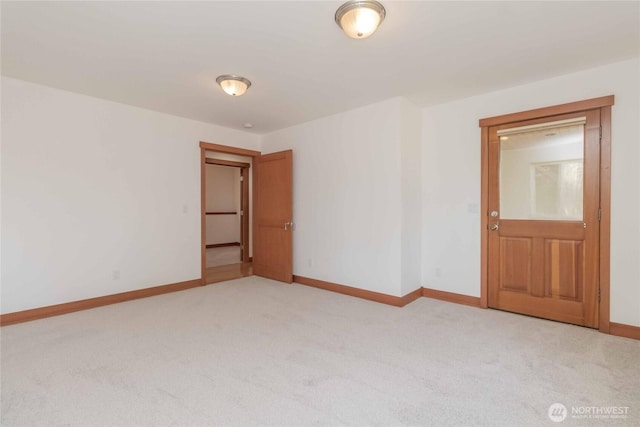 4195 Windy Cove Ln, Clinton, WA 98236 - unfurnished room featuring baseboards and light carpet