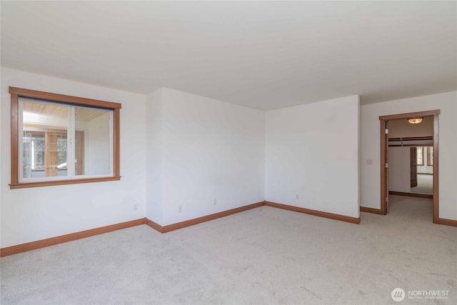 4195 Windy Cove Ln, Clinton, WA 98236 - carpeted empty room with plenty of natural light and baseboards