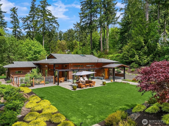 11012 Skinner Rd NE, Bainbridge Island, WA 98110 - back of house featuring a yard, a patio area, an outdoor hangout area, and a gazebo