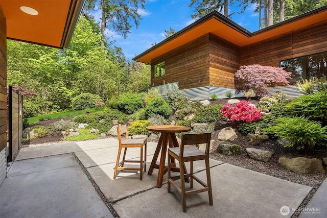 11012 Skinner Rd NE, Bainbridge Island, WA 98110 - balcony featuring a patio area