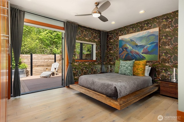 11012 Skinner Rd NE, Bainbridge Island, WA 98110 - bedroom featuring wallpapered walls, hardwood / wood-style floors, recessed lighting, access to exterior, and ceiling fan