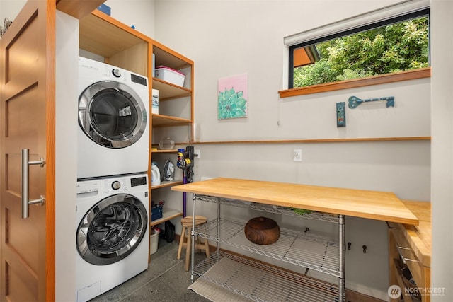 11012 Skinner Rd NE, Bainbridge Island, WA 98110 - washroom featuring stacked washer and clothes dryer